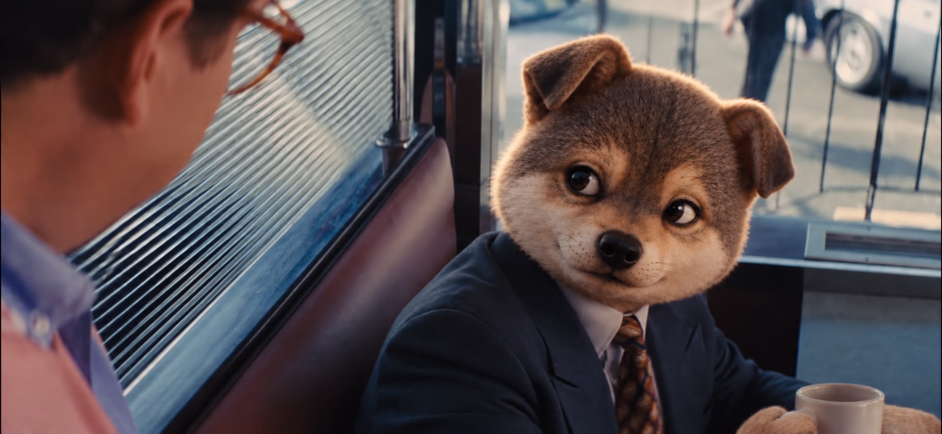 The Wolf mascot calmly tilting his head